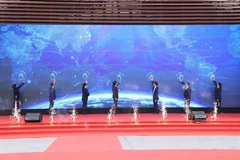 Delegates perform the launch ceremony ritual. (Photo: Photo courtesy of MoET)