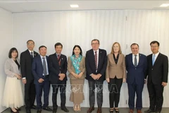 Leaders of the State Audit Office of Vietnam and the Public Audit Office of Catalonia (Spain) at the working session. (Photo published by VNA)