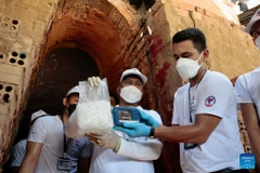 Anti-drug officials test methamphetamine in Phnom Penh, Cambodia on June 14, 2024. (Photo: Xinhua)