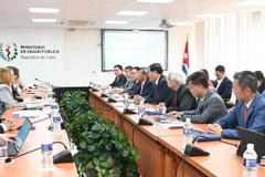 The working session between the Vietnamese delegation and the Cuban Ministry of Health (Photo: VNA)