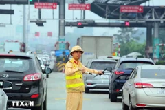 The Law on Road Traffic Order and Safety, comprising nine chapters and 89 articles, aims to create a legal basis for ensuring road traffic order and safety. (Illustrative photo: VNA)