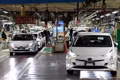 Toyota vehicles are assembled at a manufacturing plant in Thailand. (Photo: AFP/VNA)
