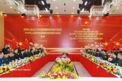 At the talks between Vietnamese Minister of National Defence General Phan Van Giang and his Chinese counterpart Senior Lieutenant General Dong Jun in Quang Ninh province on March 18. (Photo: VNA)