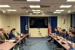 Participants at the official technical negotiation session between Vietnam and US (Photo: VNA)