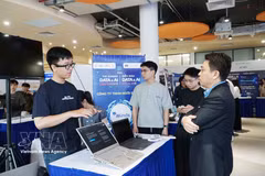 Visitors explore technology exhibition booths during the Data & AI Forum in Ho Chi Minh City on May 8, 2026. (Photo: VNA)