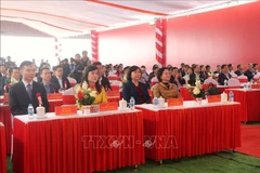 Deputy Prime Minister Pham Thi Thanh Tra (first row, far right) and other officials attend the groundbreaking ceremony for the second phase of the Que Vo II Industrial Park infrastructure development project on December 19. (Photo: VNA)