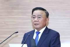 Politburo member and Permanent Member of the Party Central Committee’s Secretariat Tran Cam Tu speaks at a year-end performance review of the Committee's Commission for Policies and Strategies in Hanoi on December 26. (Photo: VNA)