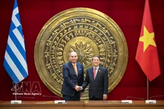 National Assembly (NA) Vice Chairman Nguyen Duc Hai (R) meets with First Vice President of the Hellenic Parliament Ioannis Plakiotakis in Hanoi on March 2 (Photo: VNA)