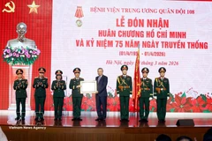 Party General Secretary To Lam presents the Ho Chi Minh Order to Military Central Hospital 108 on March 30. (Photo: NVA)