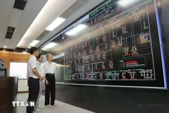 Managing and operating the power grid using information technology at the Ho Chi Minh City Power System Control CentrE. (Photo: VNA)