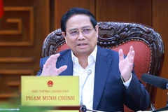 Prime Minister Pham Minh Chinh addresses the meeting (Photo: VNA)