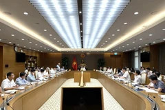 The meeting in Hanoi on May 21 (Photo: VNA)