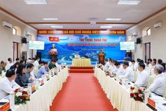 An overview of the working session (Photo: VNA)