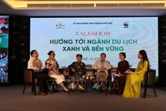 A view of the talkshow within the conference in Hue on December 12 to review and discuss strategic orientations for the 2023-2025 roadmap to reduce plastic waste in the local tourism sector. (Photo: VNA)