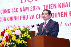 Prime Minister Pham Minh Chinh addresses the conference. (Photo: VNA)