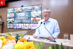 Permanent Deputy Prime Minister Nguyen Hoa Binh speaks at the conference. (Photo: VNA)