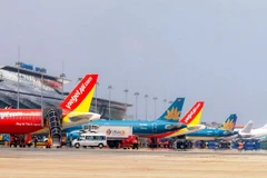 At Noi Bai International Airport in Hanoi (Photo: VNA)