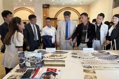Korean businesses and partners visit an exhibition showcasing Lam Dong province's typical products. (Photo: VNA)