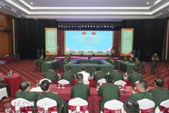 At the drill on preventing illegal border crossings by the border guard forces of Lao Cai province and China's Yunnan province on October 28. (Photo: VNA)