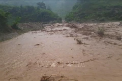 Heavy rain caused flooding over the road at Km 1 + 520 on the provincial road No.140 in Dien Bien, July 31, 2025. (Photo: VNA)
