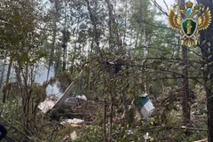 The scene of the crash of an Antonov An-24 aircraft of Angara Airlines in Amur province, Russia on July 24, 2025. (Photo: Xinhua/VNA)