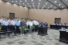 Defendants at the court (Photo: VNA)