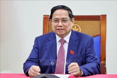 Prime Minister Pham Minh Chinh during phone talks with Alexey Likhachev, Director General of Russia’s State Atomic Energy Corporation (Rosatom). (Photo: VNA