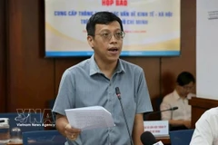 Nguyen Hoang Anh, deputy head of the General Policy Division at the municipal Department of Finance, speaks at the press briefing. (Photo: VNA)
