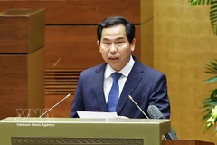 Chairman of the National Assembly Office and Chief of the National Election Council (NEC) Office Le Quang Manh delivers a summary report on the results of the elections for deputies to the 16th National Assembly of Vietnam and People’s Councils at all levels for the 2026–2031 tenure. (Photo: VNA)