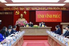 Prime Minister Pham Minh Chinh works with the Vinh Phuc Party Committee's Standing Board on March 16 (Photo: VNA)