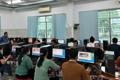 People take the test on computers for A1 driving licence in Tây Ninh province. (Photo: VNA)