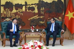 Prime Minister Pham Minh Chinh and Israeli Minister of Labour Rabbi Yoav Ben Tzur at their meeting in Hanoi on May 21. (Photo: VNA)
