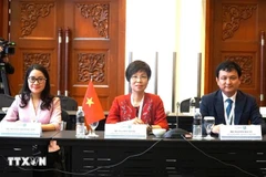 VNA General Director Vu Viet Trang (middle) at the event (Photo: VNA)