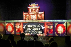 The Thang Long Imperial Citadel Heritage Site in Hanoi presents the play "Thang Long Capital" using 3D mapping technology and a digital experience space. (Photo: VNA)