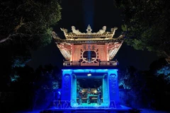 Khue Van Cac (Pavilion of Constellation of Literature) at the Temple of Literature in Hanoi attracts tourists with its lighting effects and traditional art performances. (Photo: VNA)
