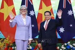 Prime Minister Pham Minh Chinh (R) meets with Australian Governor-General Sam Mostyn in Hanoi on September 10. (Photo: VNA)