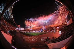 The fireworks displays at the closing ceremony of the 33rd SEA Games on the evening of December 20. (Photo: VNA)