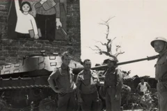 Hungarian journalist László Rozsa (2nd left) seen during a mission trip to the liberated region of Dong Ha, Quang Tri province in 1972. (Photo courtesy of the National Archives Centre III)