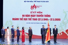 Party General Secretary To Lam presents the First-Class Labour Order to the Sports Authority of Vietnam under the Ministry of Culture, Sports and Tourism (Photo: VNA)