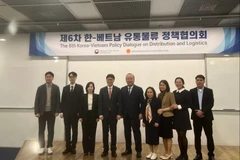 Delegates at the policy dialogue (Photo: VNA)