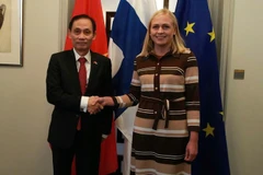 Acting Vietnamese Minister of Foreign Affairs Le Hoai Trung and Finnish Minister for Foreign Affairs Elina Valtonen at their meeting in Helsinki on October 21. (Photo: nhandan.vn)