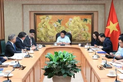 At the meeting between Deputy Prime Minister Nguyen Chi Dung (C) and AboitizPower President and CEO Danel C. Aboitiz. (Photo: VNA)