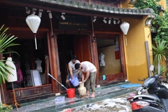 Hoi An residents clean up after floods (Photo: VNA)