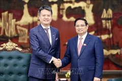 Prime Minister Pham Minh Chinh receives Director General of the World Intellectual Property Organisation (WIPO) Daren Tang in Hanoi on September 25, 2025 (Photo: VNA)