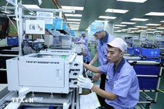 Workers at the VSIP Hai Phong industrial and urban complex, which specialises in producing electronic components for office equipment. (Photo: VNA)