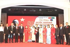 Participants in the ceremony in Macau (China) on September 8 marking the 80th anniversary of the August Revolution and National Day of Vietnam. (Photo: VNA)