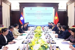 The talks between Chief Justice of the Supreme People’s Court of Vietnam Le Minh Tri and his Lao counterpart Viengthong Siphandon in Hanoi on October 28, 2025. (Photo: VNA)