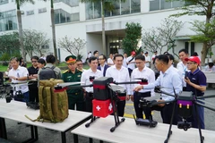 At a display of UAVs (Photo: VNA)