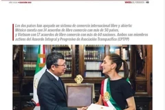 Vietnamese Ambassador Nguyen Van Hai (L) and Mexican President Claudia Sheinbaum on Voces Del Periodista newspaper. (Screenshot by VNA)