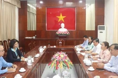 Representatives from ActionAid Vietnam and Can Tho City People's Committee at the working session to discuss orientations for the organisation's programmes and projects after the merger of Can Tho, Soc Trang, and Hau Giang. (Photo: VNA) 